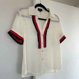 Off white ruffled blouse